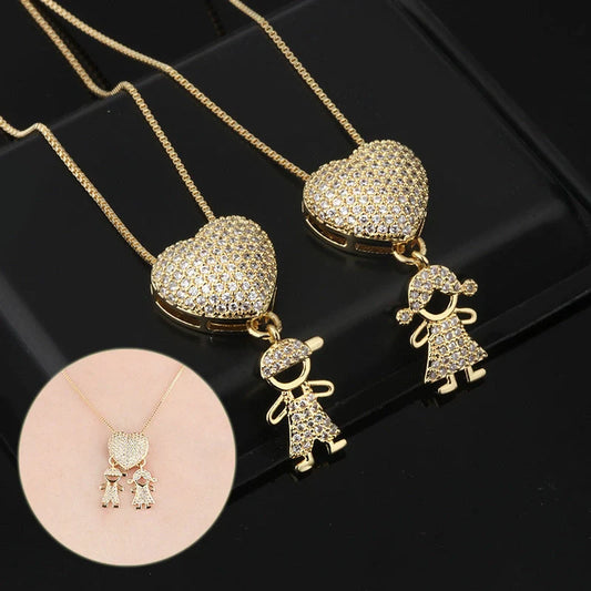 Gold cubic zirconia heart pendant necklace for mothers, symbolising family love.