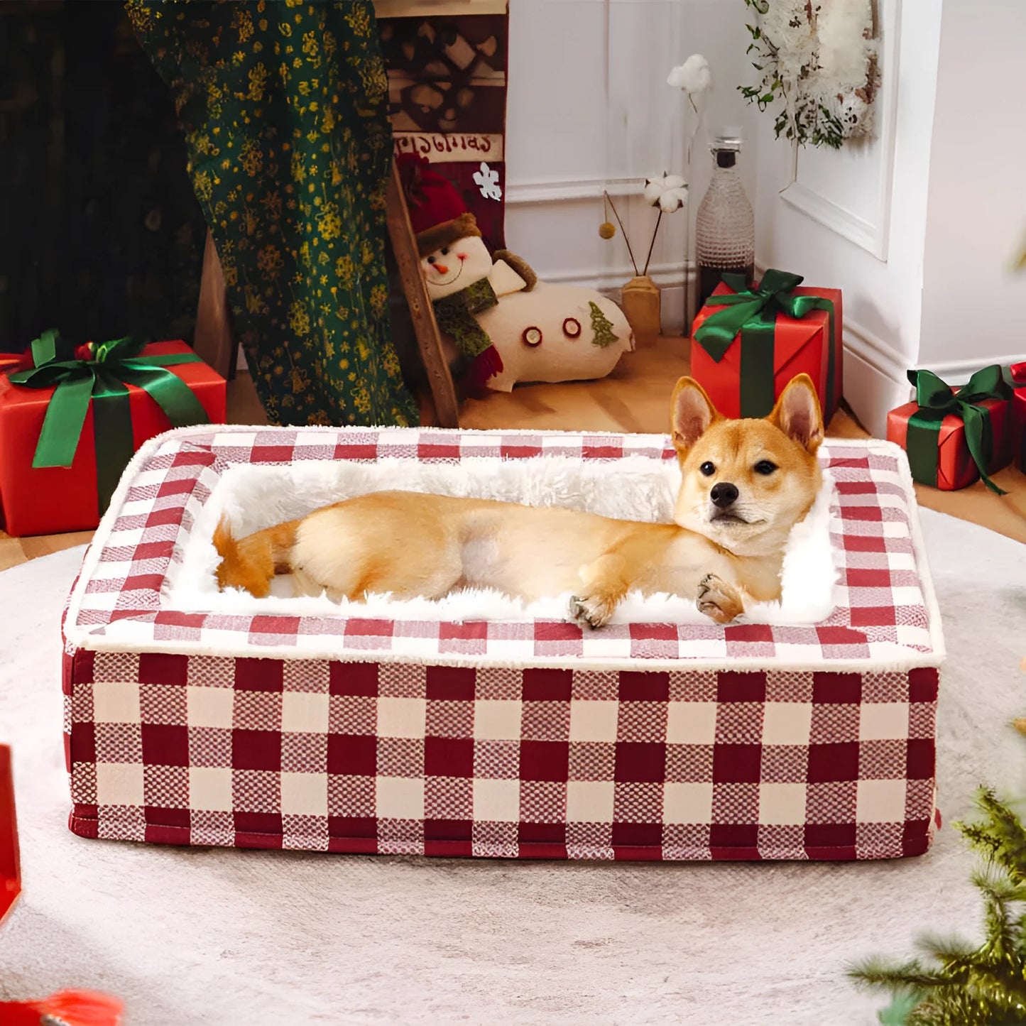 Classic red plaid dog bed cushion with a removable cover, shown in a large size next to a dog crate.