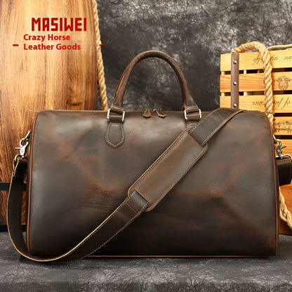 Men's vintage-style genuine leather crossbody bag in black, shown with spacious main compartment.
