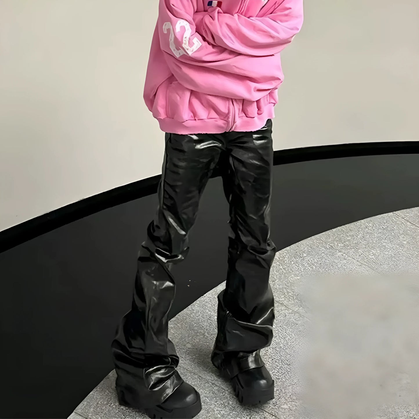 Black shiny patent leather coated skinny jeans with straight leg and mid waist