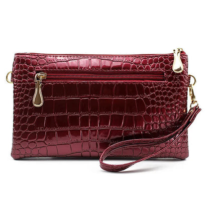 Women's black soft PU leather messenger bag with shoulder strap and square design