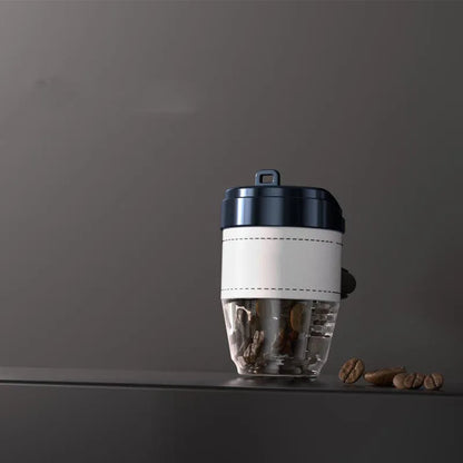 Solid coffee cup shaped car air freshener in plastic, shown in brown colour on a car dashboard.