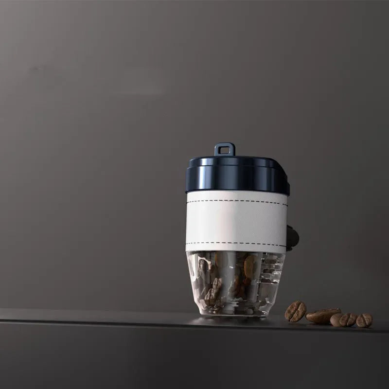 Brown plastic coffee cup-shaped solid car air freshener for odour removal and fragrance.