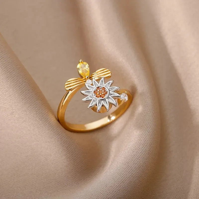 Adjustable copper decompression ring with rotatable geometric design in gold finish