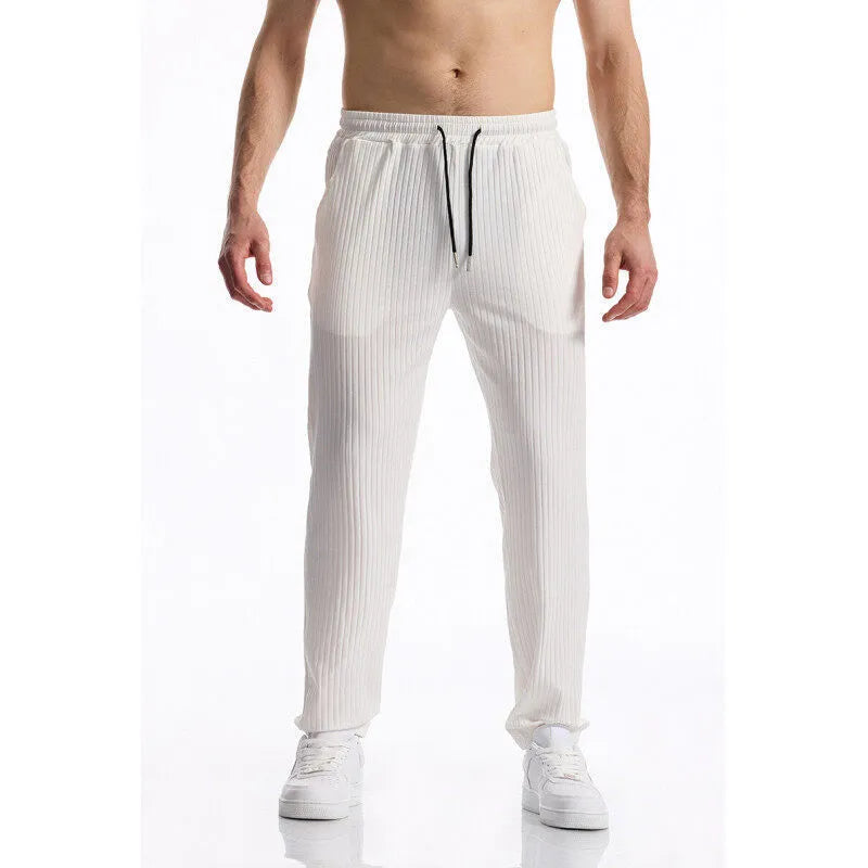 Silky rib fabric baggy straight-leg casual trousers with an elastic drawstring waist in khaki colour.