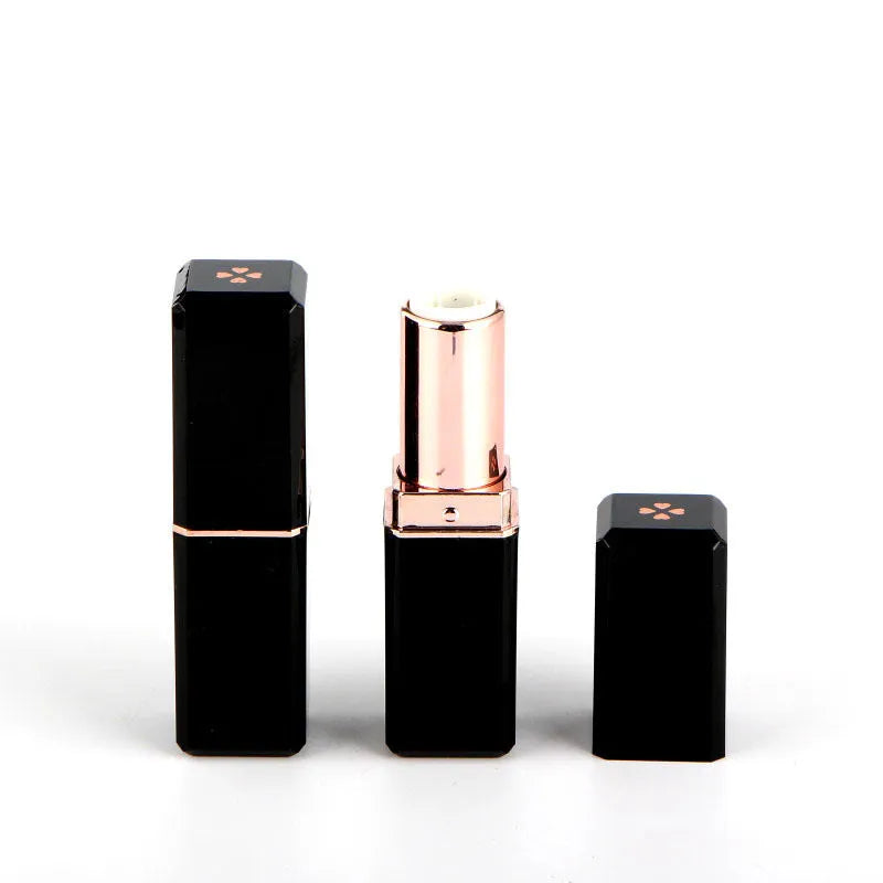 Empty lipstick tube in Clover style 121 calibre for makeup refill and DIY projects, made from ABS plastic using injection moulding, available in black, white, pink, and red colour options, supplied as a single unit in foam laminate carton packaging
