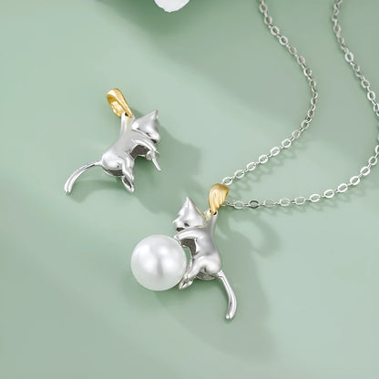 Close-up of a delicate 925 sterling silver cat charm on a 45cm clavicle chain with a lobster clasp.