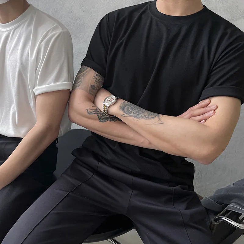 Men's slim-fit cotton half-sleeve T-shirt in black and white colours on a size chart.
