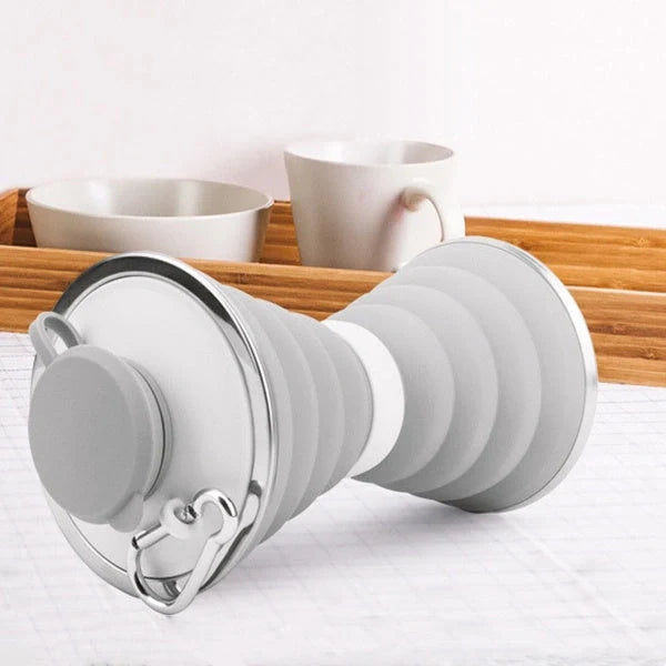 500ml foldable silicone water bottle in various colors, showcasing its compact and leak-proof design