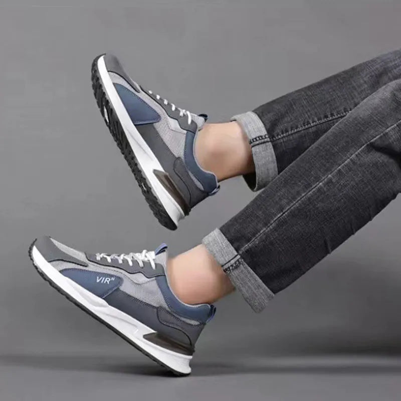 Men's colour block mesh sneakers in black, grey, and white with lace-up front and low-top design