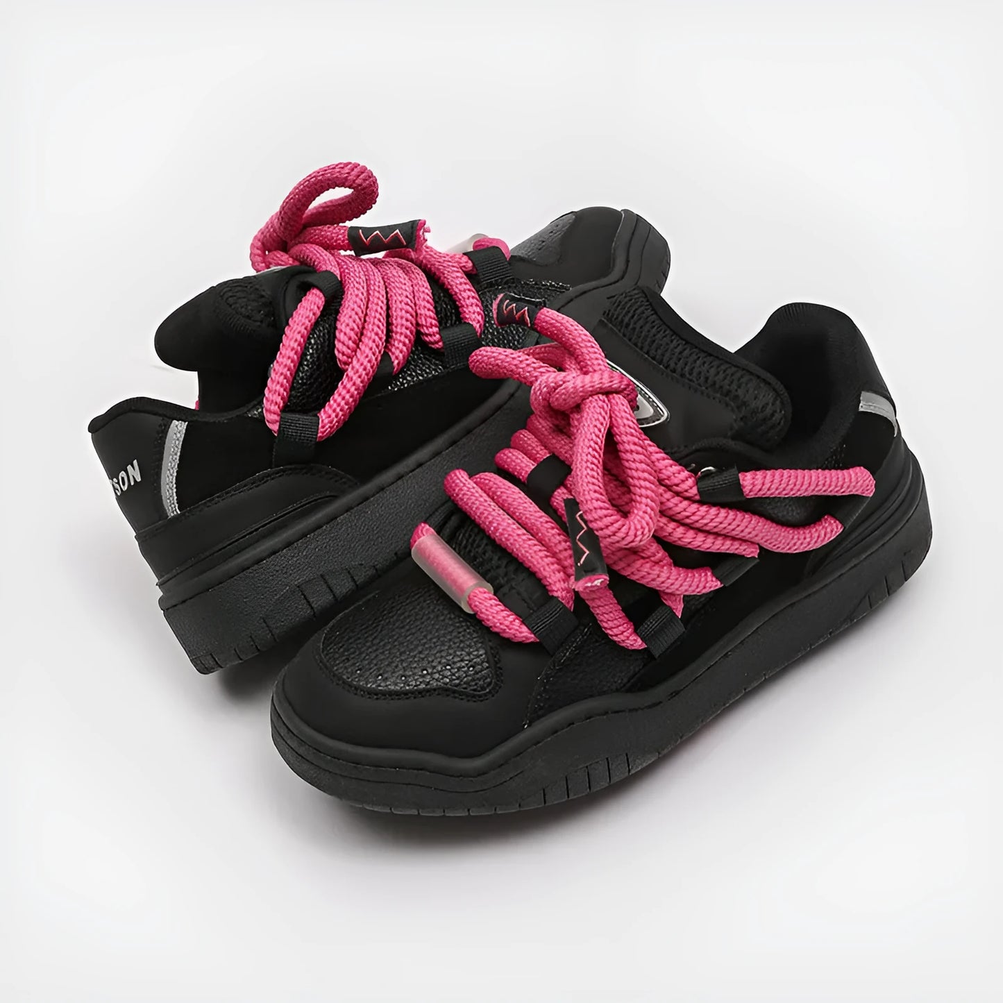 Low-top unisex casual shoes in denim blue with a round toe, thick rubber sole, and front lace-up closure.