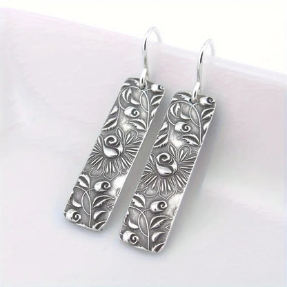 Geometric long earrings with carved vine pattern in silver zinc alloy