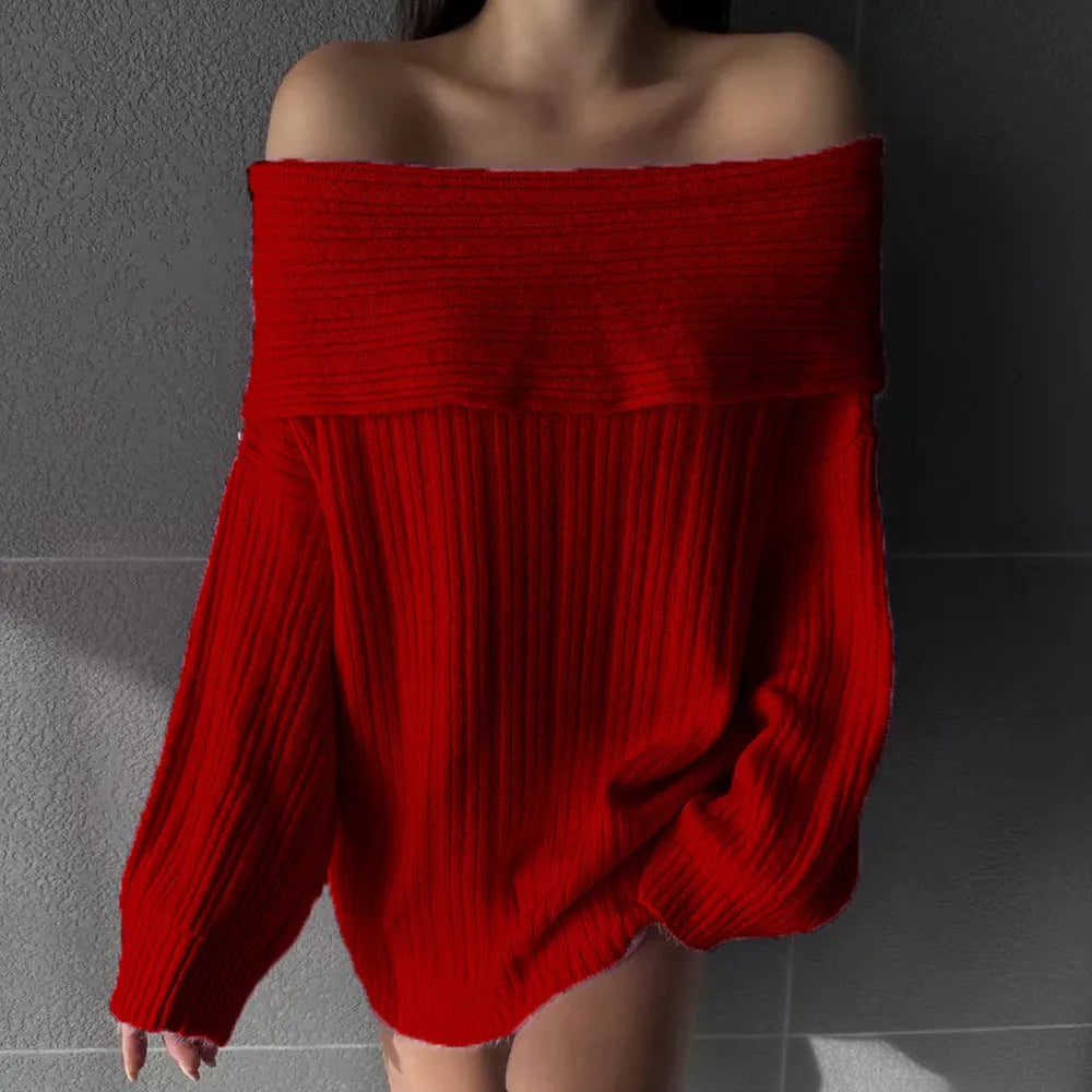 Woman wearing a loose white acrylic knit pullover sweater with long sleeves and an off-neck design.