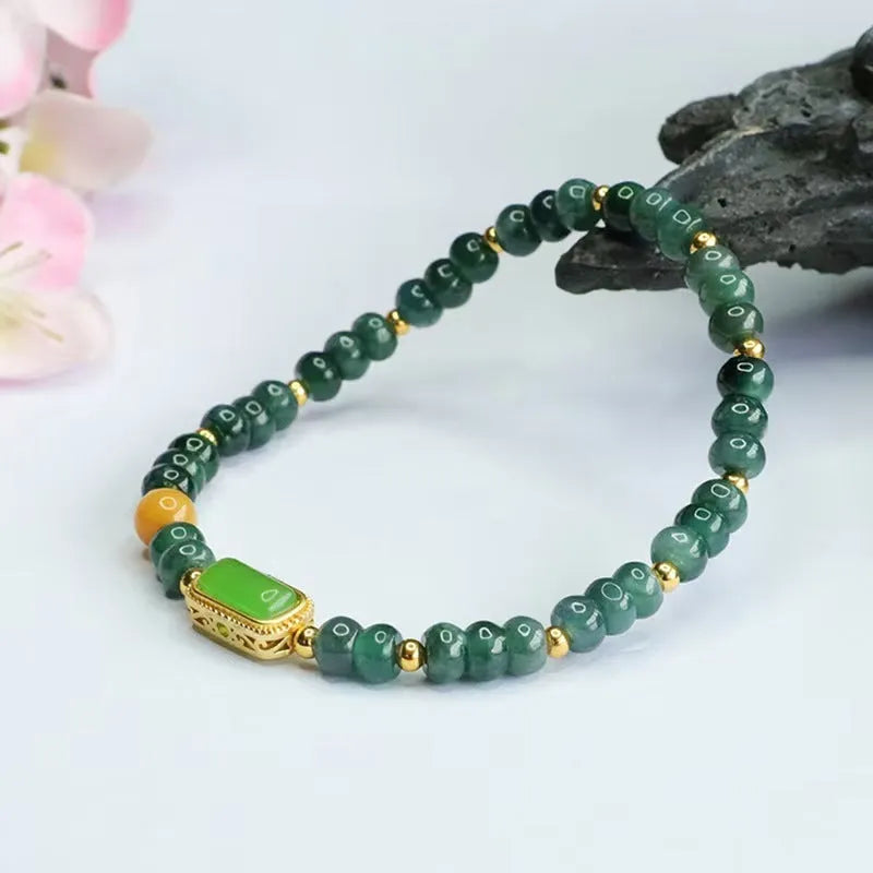 Natural stone blue water jade abacus bead bracelet with electroplated topaz accents and geometric shapes