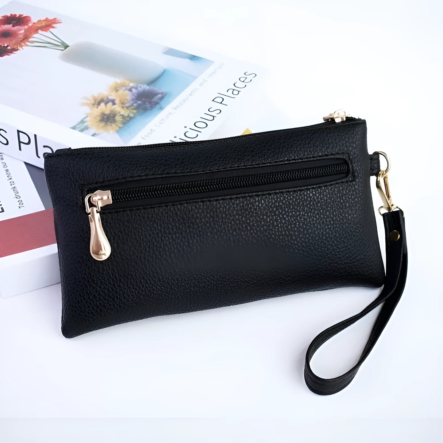 Soft surface square PU crossbody bag and clutch with internal zipper pocket in various colours.