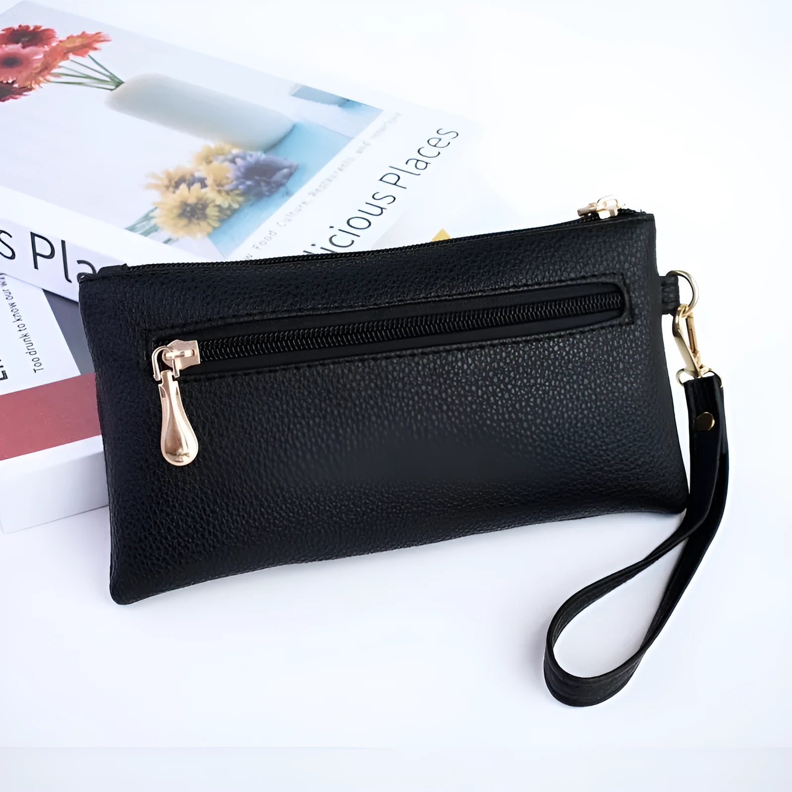 Soft surface square PU crossbody bag and clutch with internal zipper pocket in various colours.