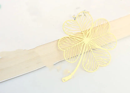 Brass metal bookmark with hollow plating leaf design and rose gold tassel decoration