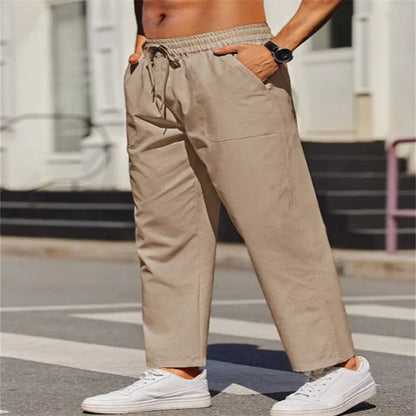 Men's straight-leg linen trousers with an elastic waist in a solid colour