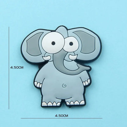 Nine PVC soft rubber cartoon animal fridge stickers including monkey, crocodile, leopard, lion, zebra, elephant, giraffe, and ostrich.