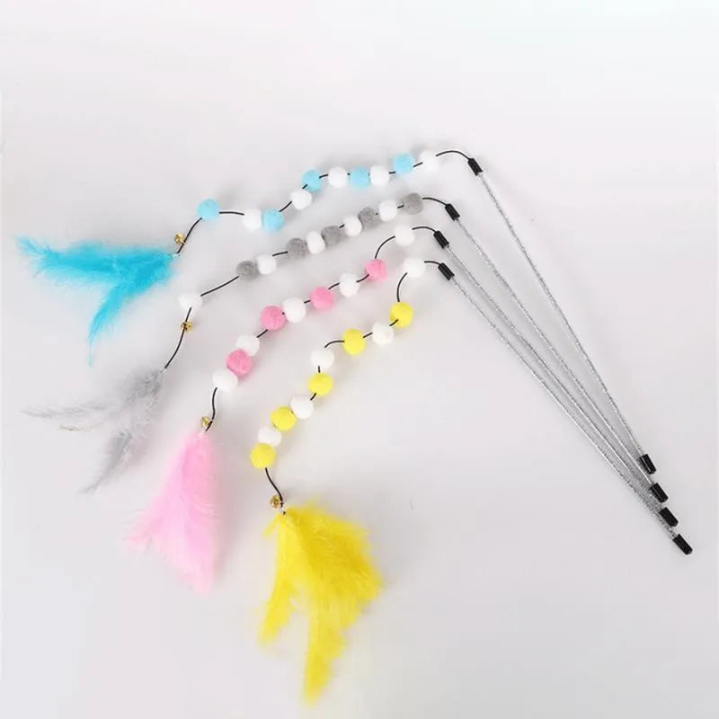 Blue cat teaser stick toy with a bell and a grey feather pompon, shown next to a grey and yellow version.