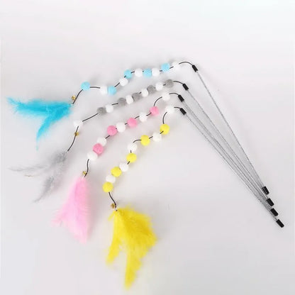 Blue cat teaser stick toy with a bell and a grey feather pompon, shown next to a grey and yellow version.