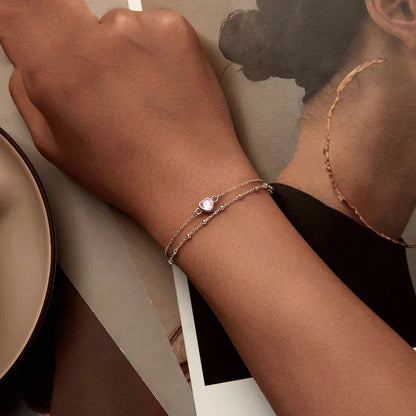 Sweet girlish sterling silver bracelet with a small heart charm on an adjustable chain.
