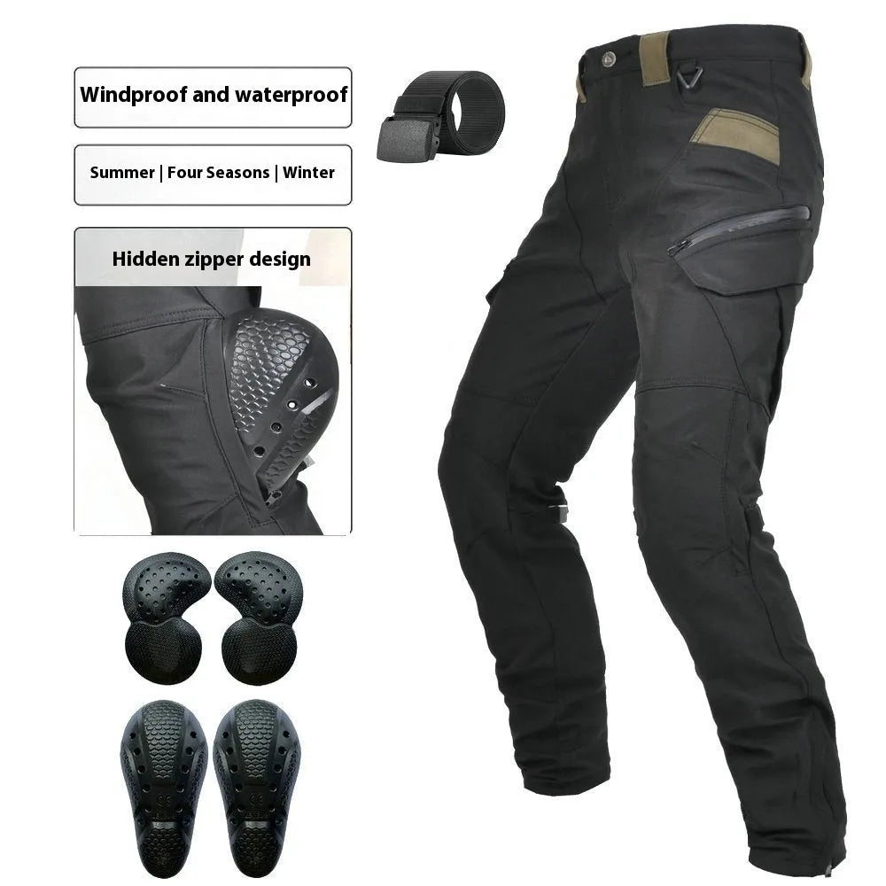 Motorcycle rider wearing green waterproof trousers with removable protective armour on knees and hips.