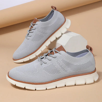 Men's grey and black low-heel casual sneaker with mesh fabric upper and round toe