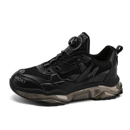 Men's black casual shoes with a rotating button fastener and mesh upper on a low platform sole