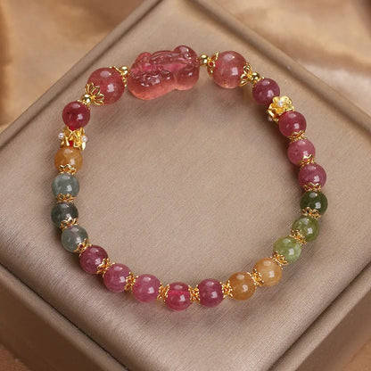 Women's pink and red crystal bracelet with strawberry quartz and tourmaline beads