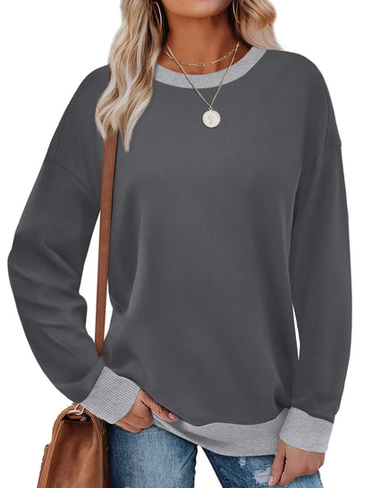 Loose fit striped long sleeve top for women on a hanger, shown in apricot colour.