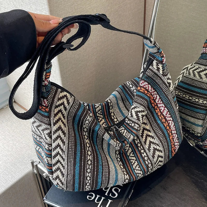 Women's ethnic style canvas crossbody dumpling bag in multiple colours with decorative sewing thread details