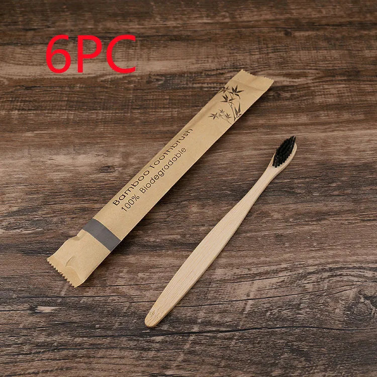 10 natural bamboo toothbrushes with charcoal bristles in six colours showing 17.5cm length