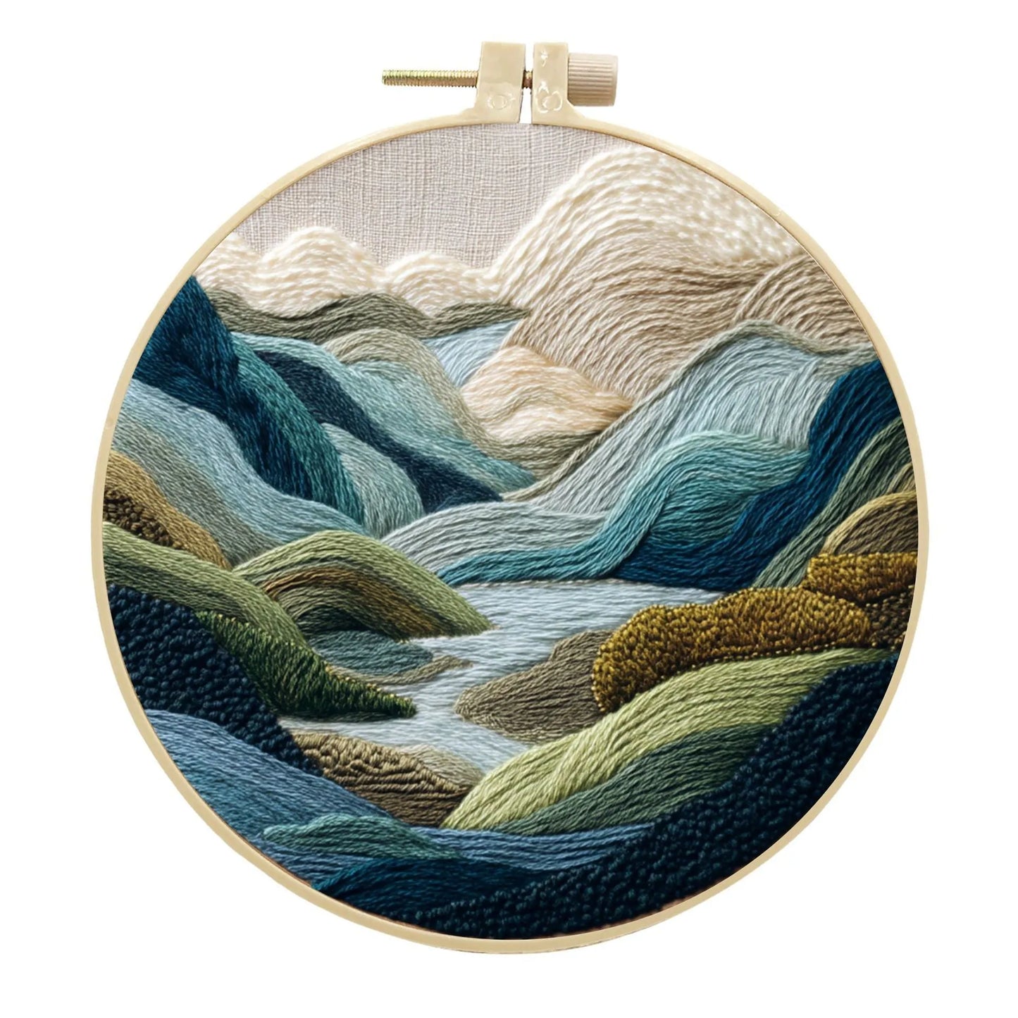 Complete DIY embroidery kit with 15cm bamboo frame, pre-printed landscape fabric, threads, and needles laid out.