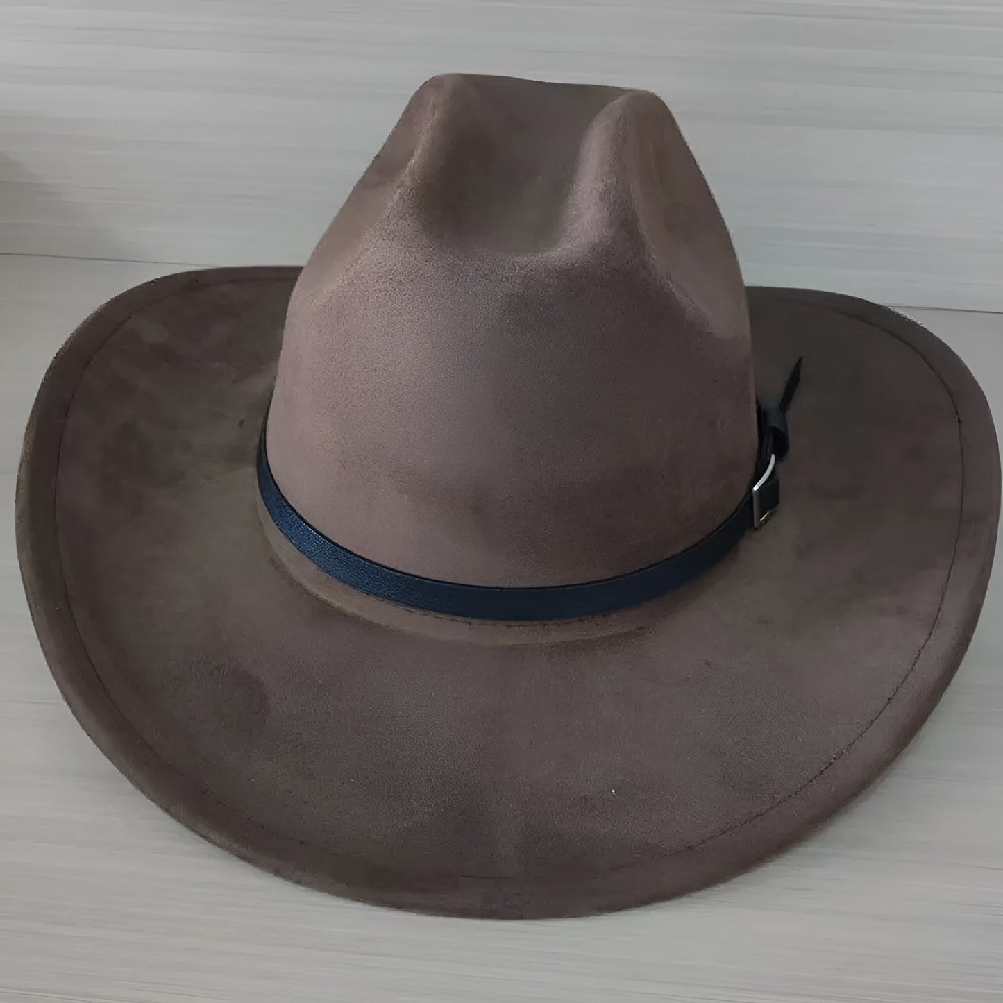 Brown leather velvet Western cowboy hat with curved brim and conical crown
