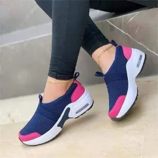 Women's lightweight flat sneakers in mesh with a rubber sole, shown in multiple colours.
