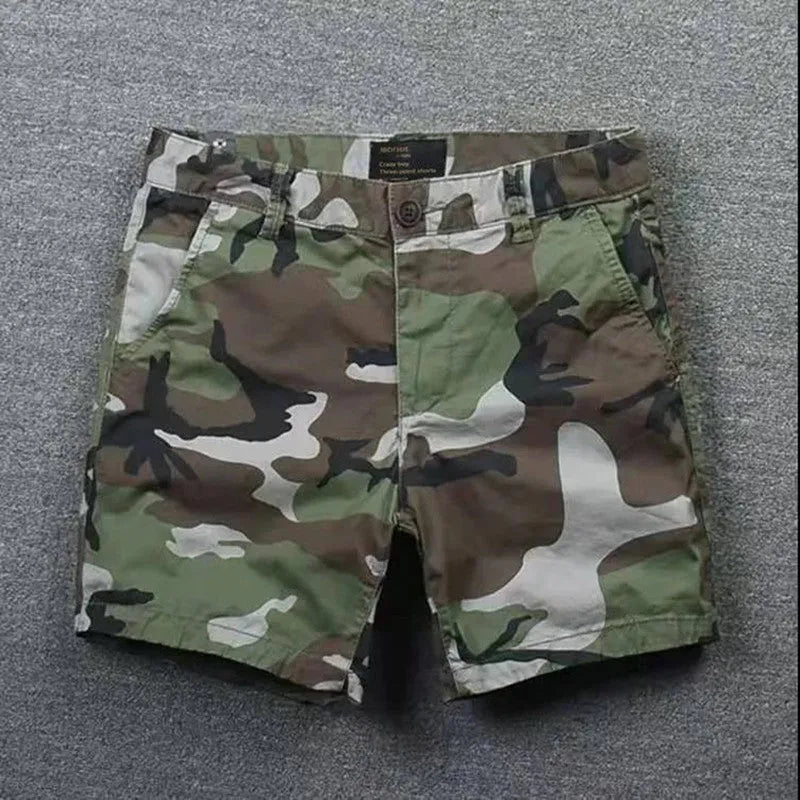 Men's pure cotton loose-fitting straight-leg shorts in a camouflage green colour.