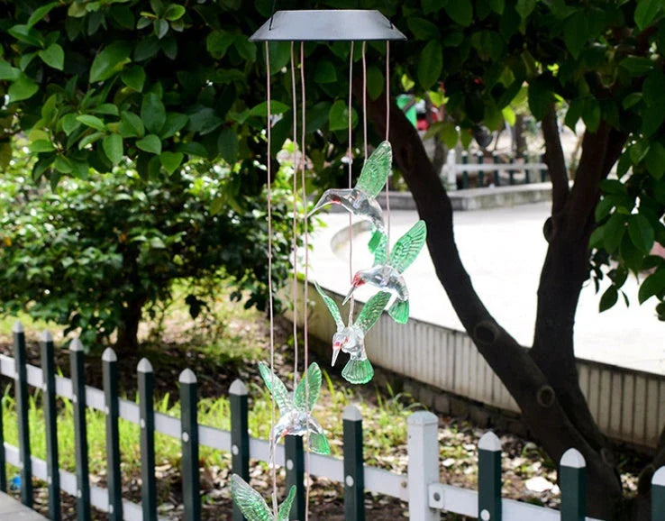Color-changing solar-powered outdoor wind chime with hummingbird and butterfly design for patio, yard, and garden decor