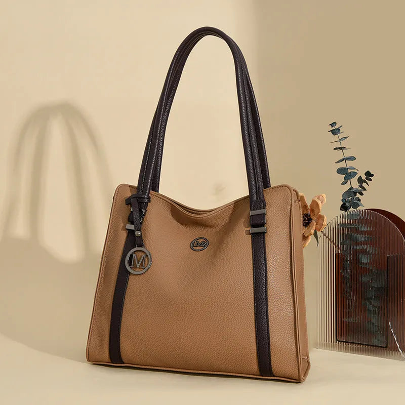 Soft black PU leather women's crossbody bag with double strap, showing outer sandwich pocket.