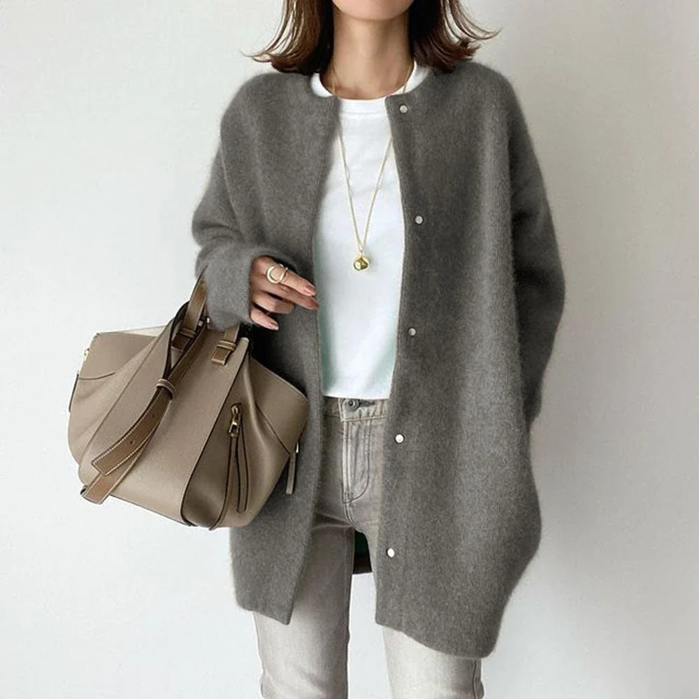 A stylish and cozy knit cardigan jacket in a variety of colors, perfect for autumn and winter wear