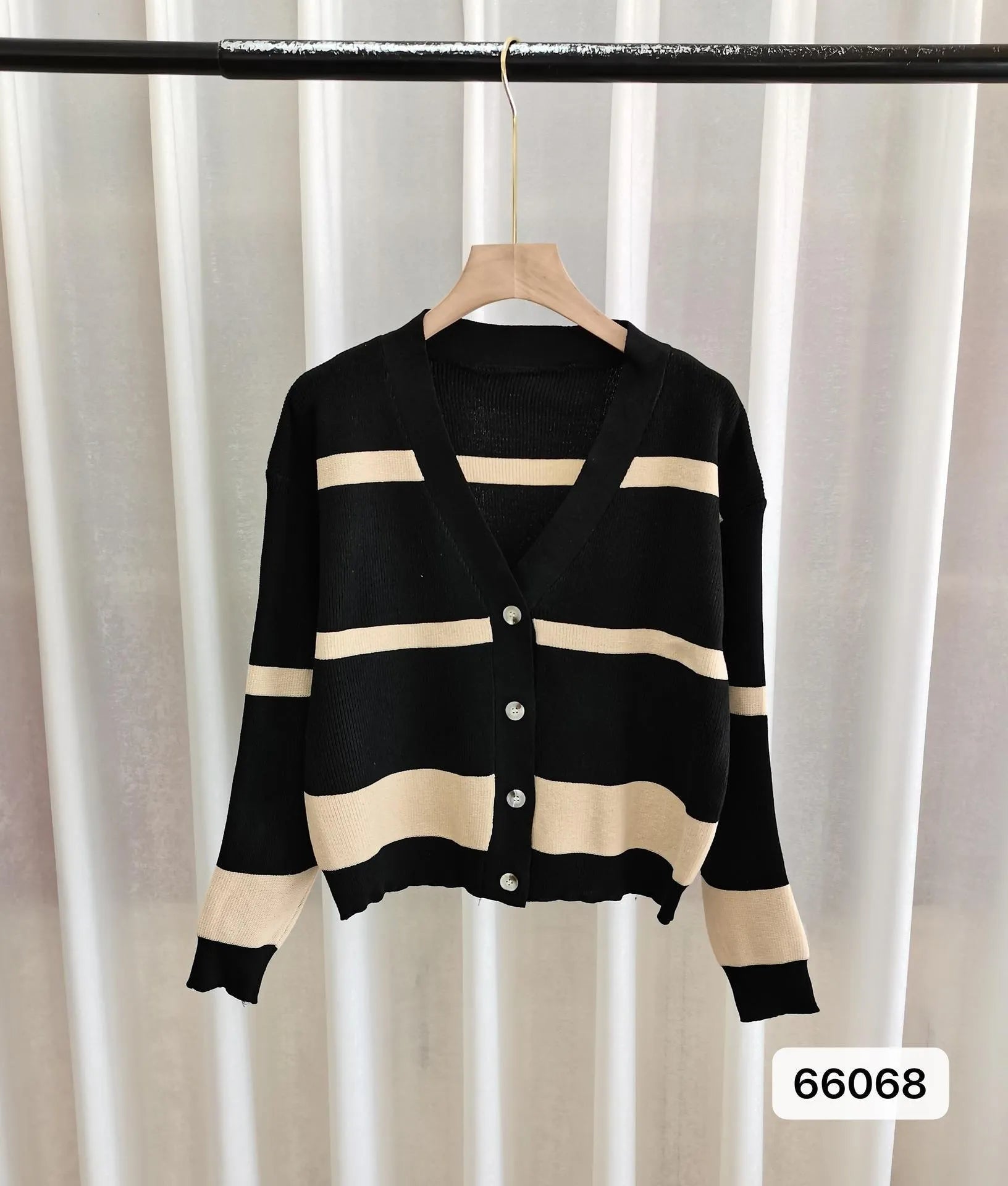 Women's black and white striped V-neck button cardigan with a 3D pattern and slim fit.