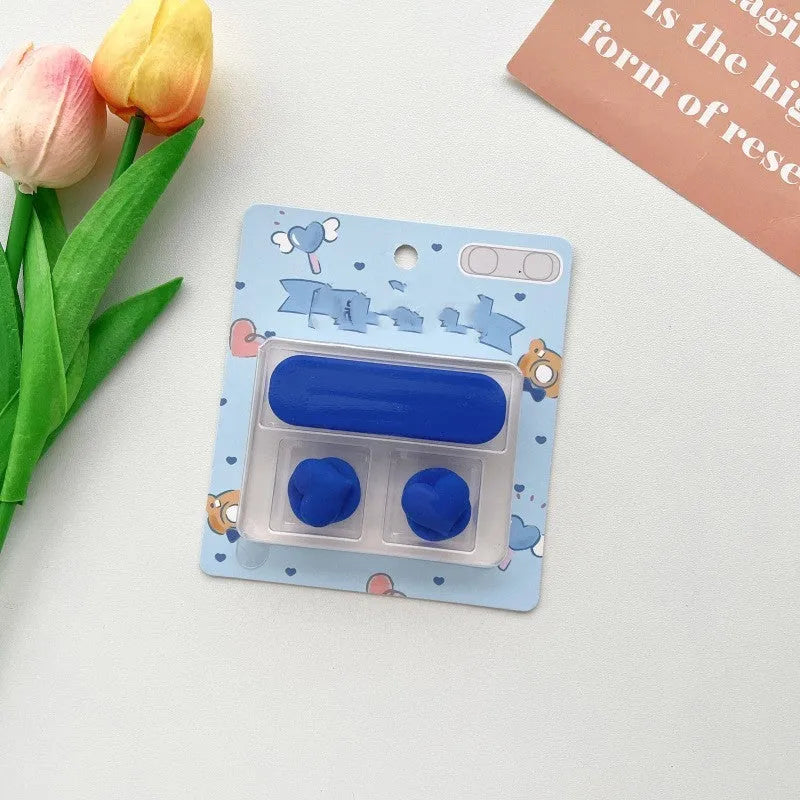 Cartoon-themed plastic magnetic data cable fixer for desktop organisation.