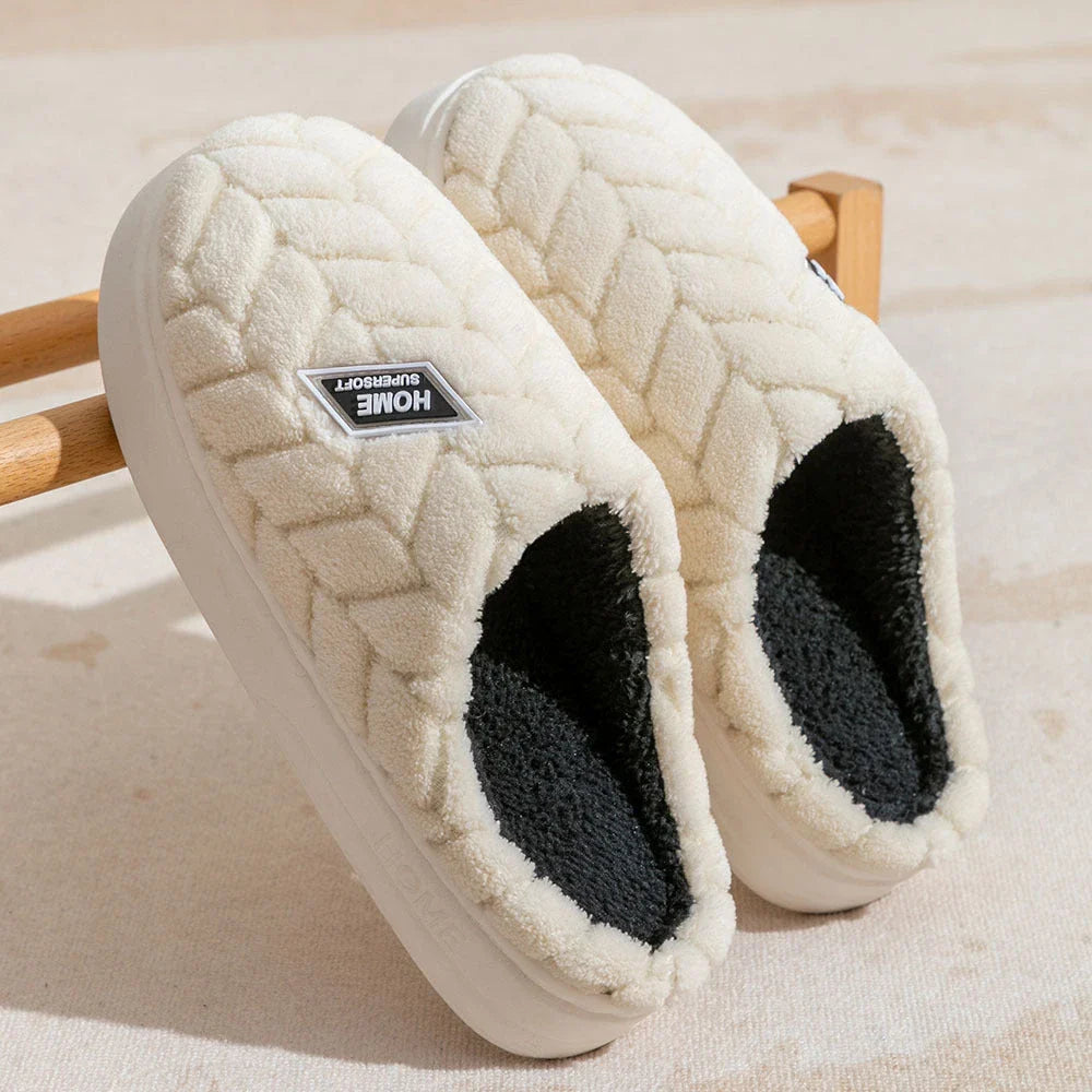Cosy plush slippers with thick, non-slip soles and fleece lining, available in a variety of stylish colours