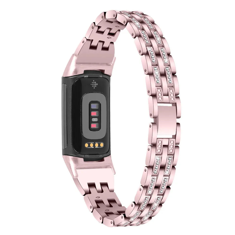 Diamond-patterned metal watch strap for Fitbit Charge 5 in rose gold colour.