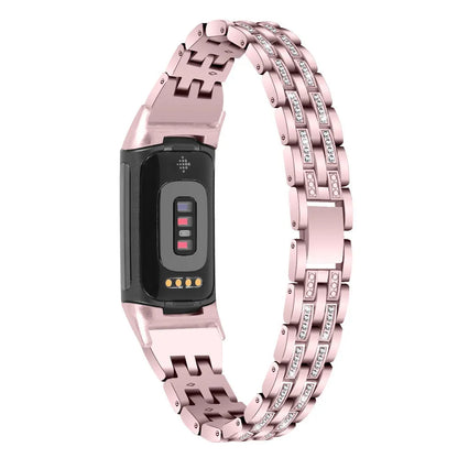 Diamond-patterned metal watch strap for Fitbit Charge 5 in rose gold colour.