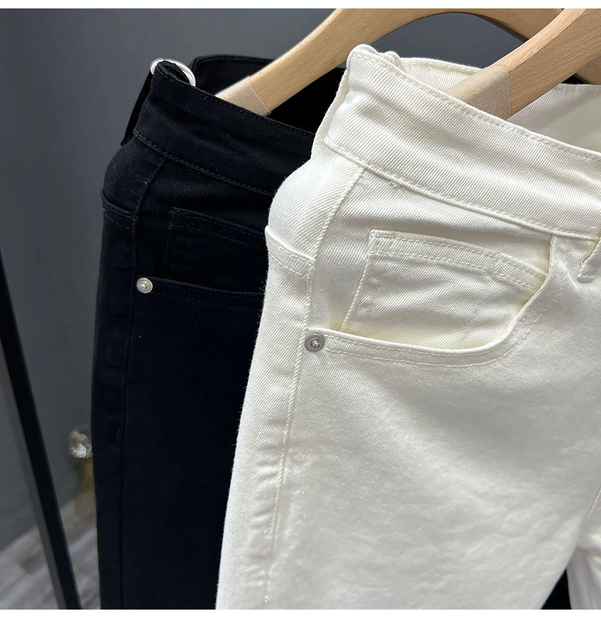 Men's white slim fit jeans with mid to low waist, micro elastic denim and small straight leg