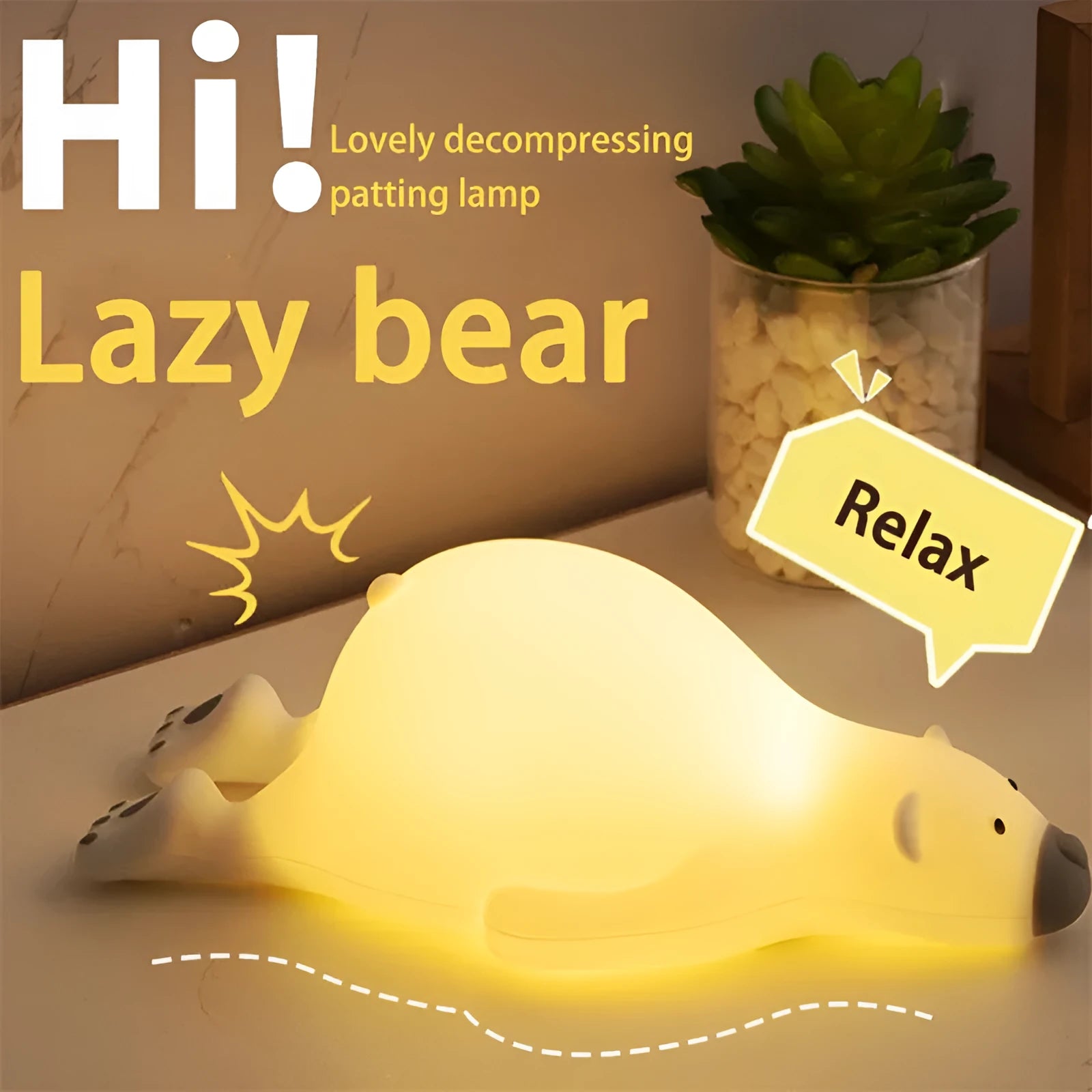 White bear-shaped silicone night light on a table with USB cable.