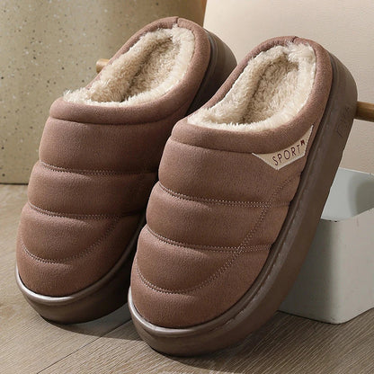 Cozy plush slip-on slippers in various colors, featuring a soft suede-like upper and a supportive EVA sole for maximum comfort and warmth.