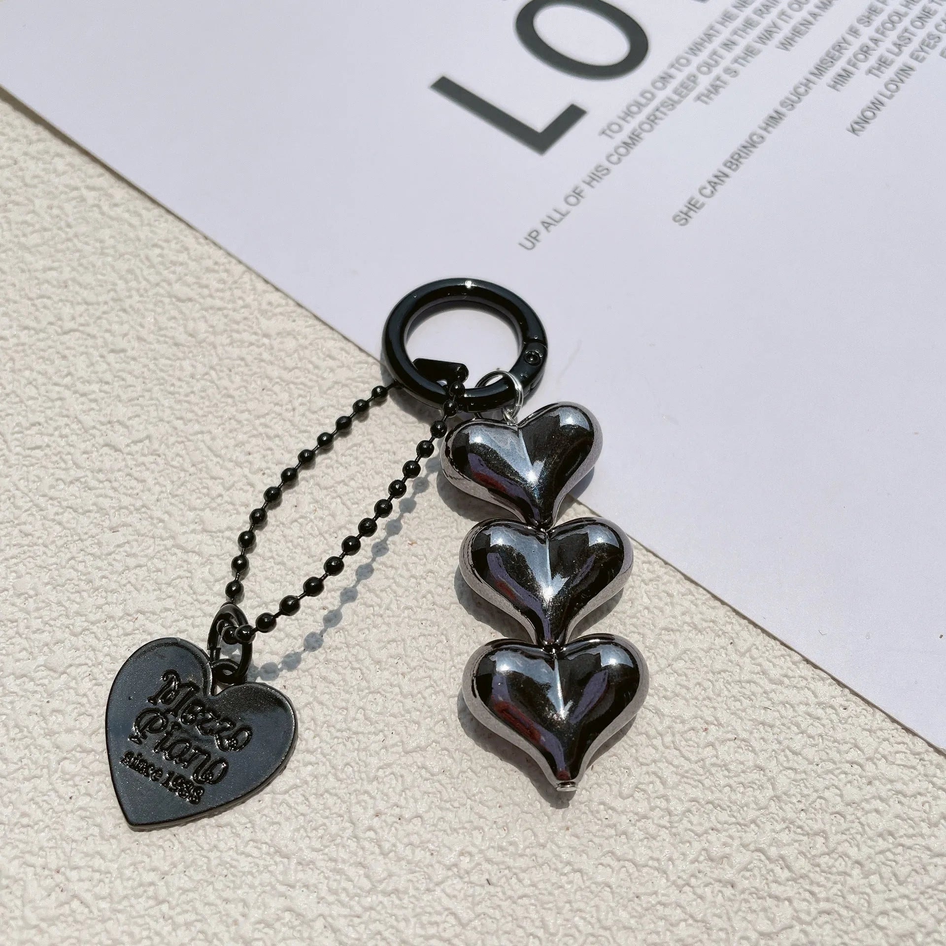 Acrylic peach-shaped key ring with love heart design and electroplated finish