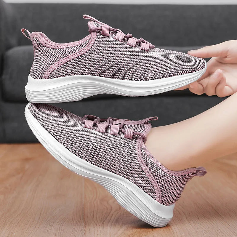 Women's black mesh casual sneakers with lace-up front and lightweight EVA sole